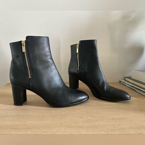 Short black leather heeled booties - 12